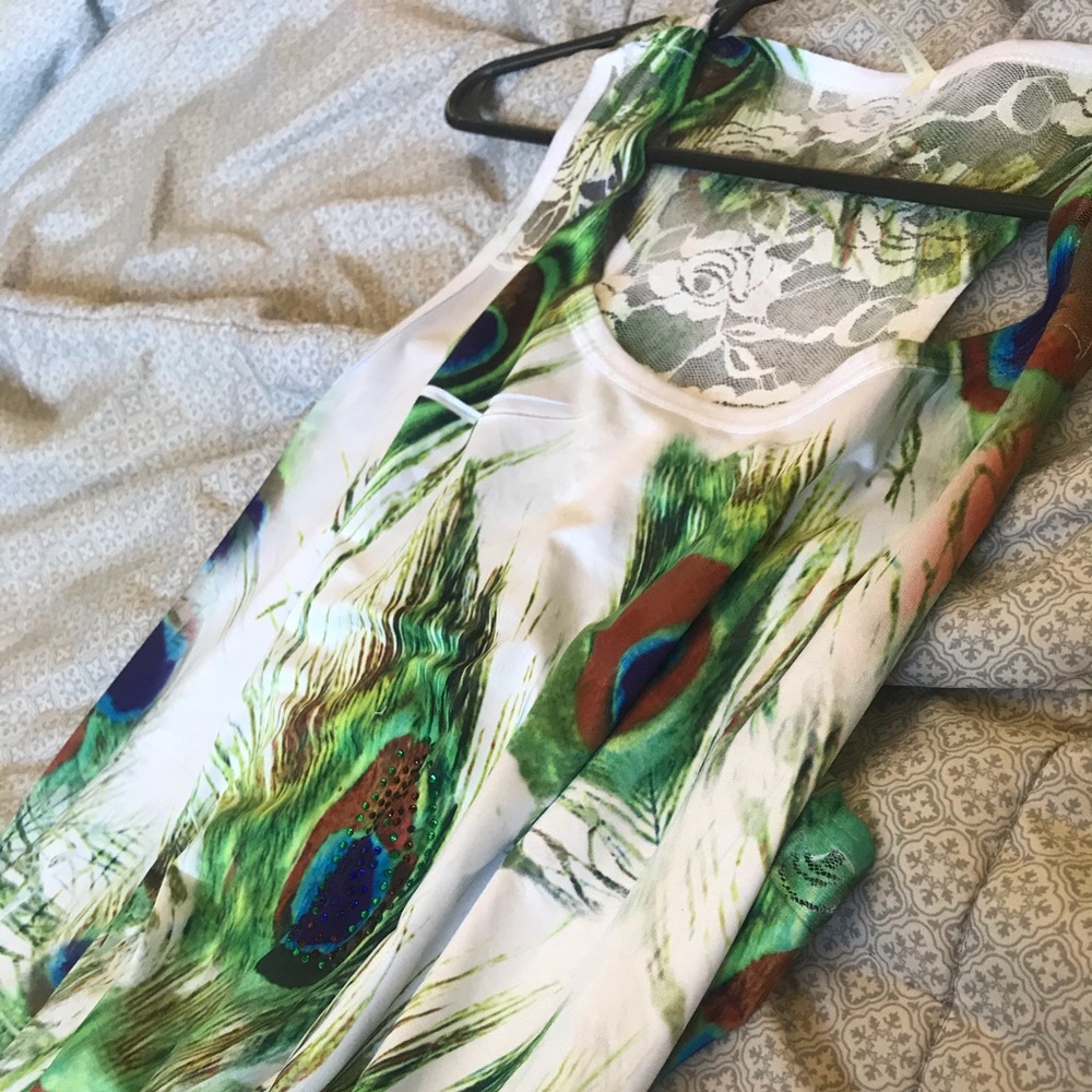 White peacock feather dress..lace and rhinestones.
